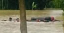 বন্যার কারণে ভেলায় ভাসিয়ে লাশ নেওয়া হলো ২ কিমি দূরের কবরস্থানে